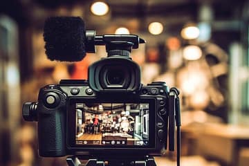 take-action-make-things-happen-shot-young-businessman-businesswoman-using-digital-tablet-laptop-modern-office